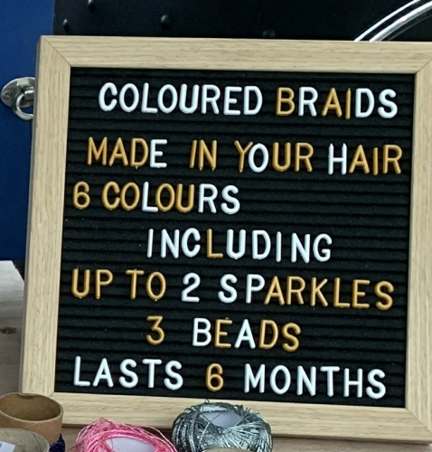 Hair braiding instruction sign